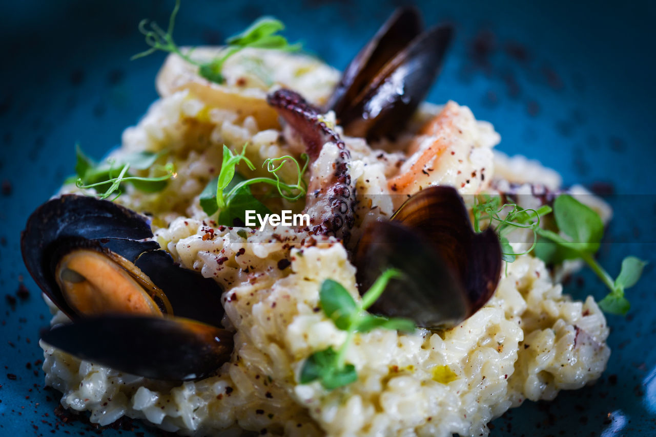 Tasty italian risotto with seafood and spices