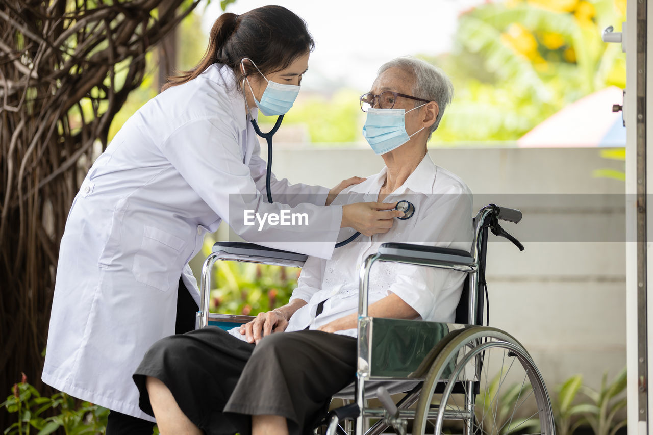 Doctor examining patient at hospital