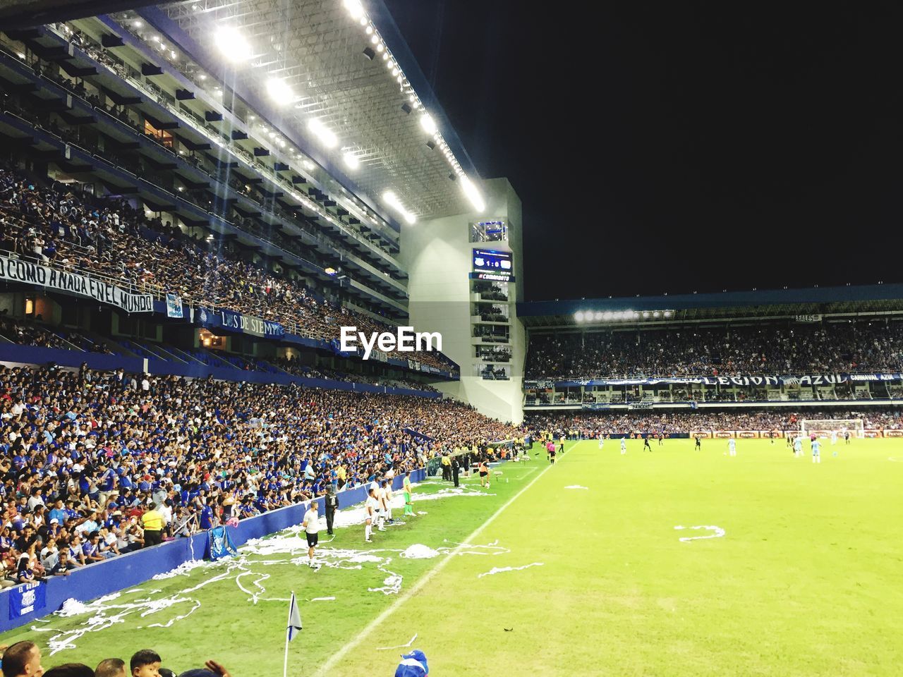 CROWD PLAYING SOCCER ON FIELD