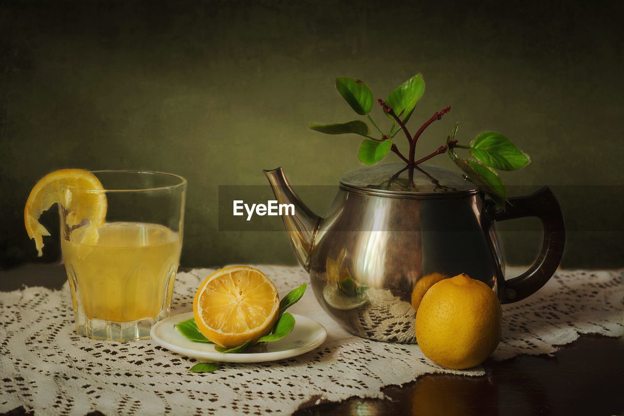 Fruits and tea on table