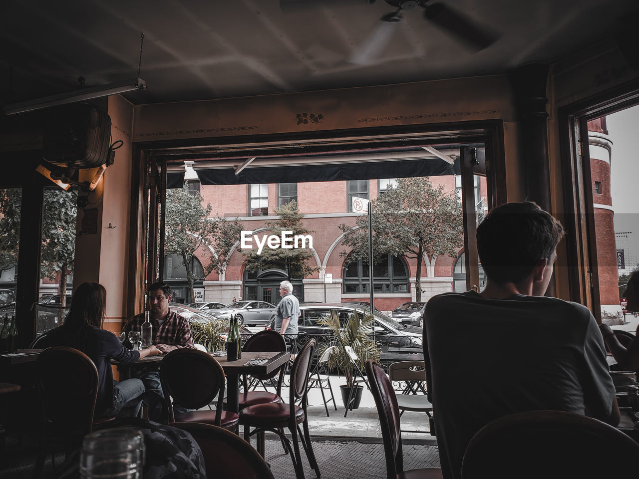 PEOPLE SITTING IN RESTAURANT