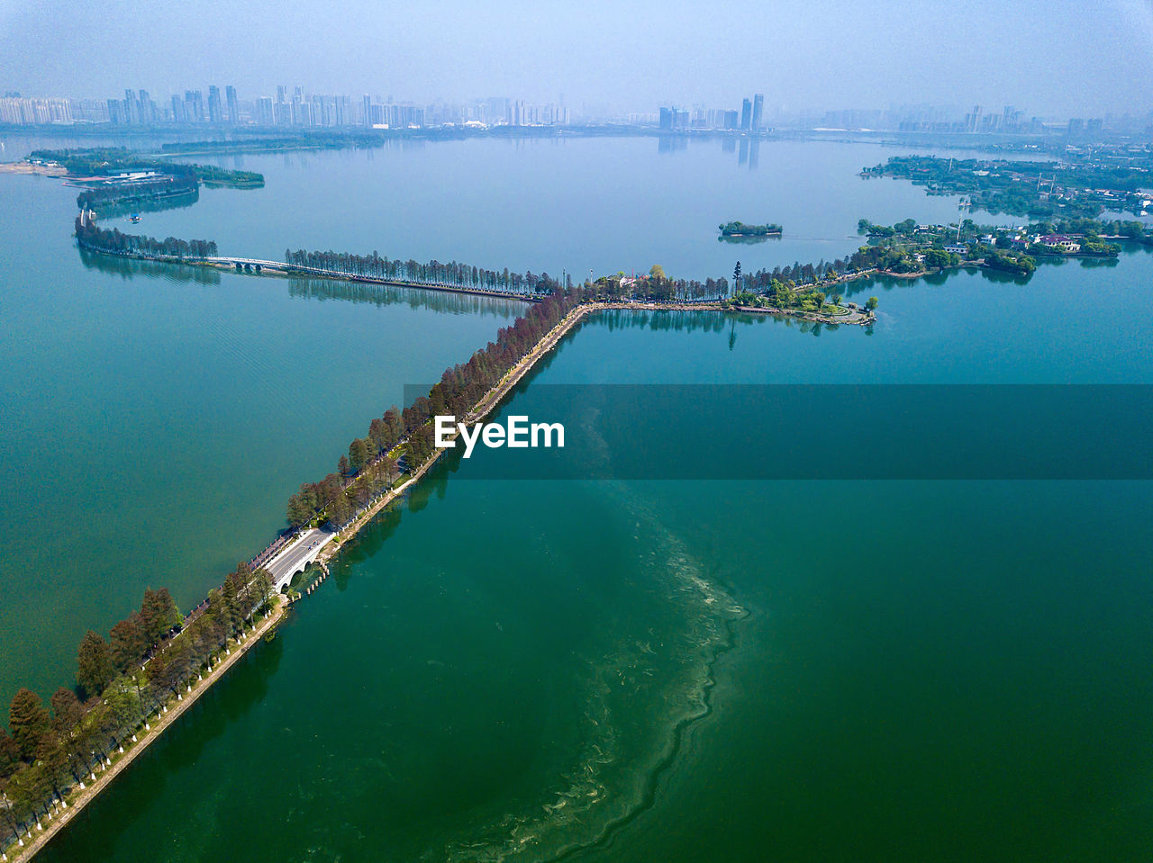 High angle view of city by sea