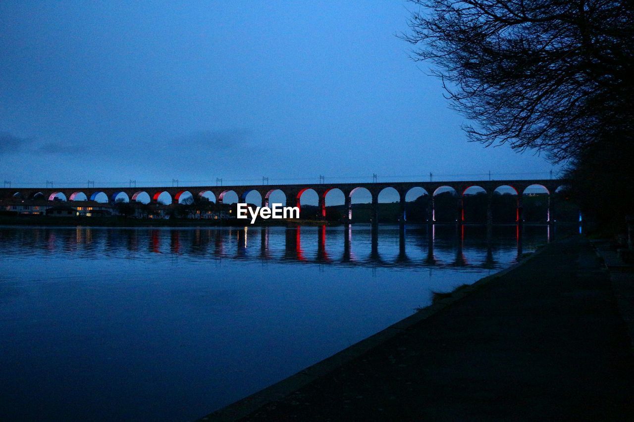 Royal border bridge over tweed river at dusk