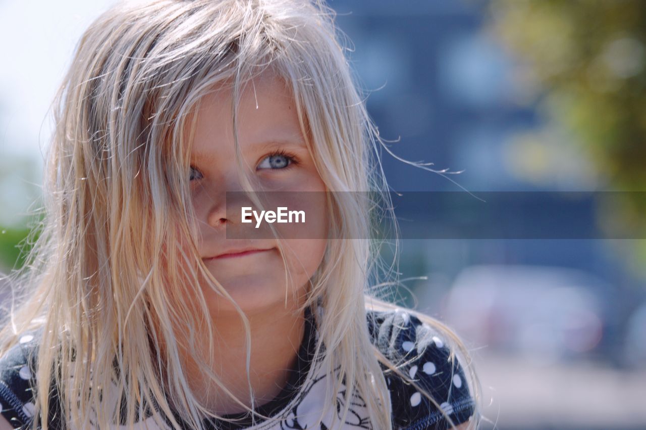 Close-up of girl looking away