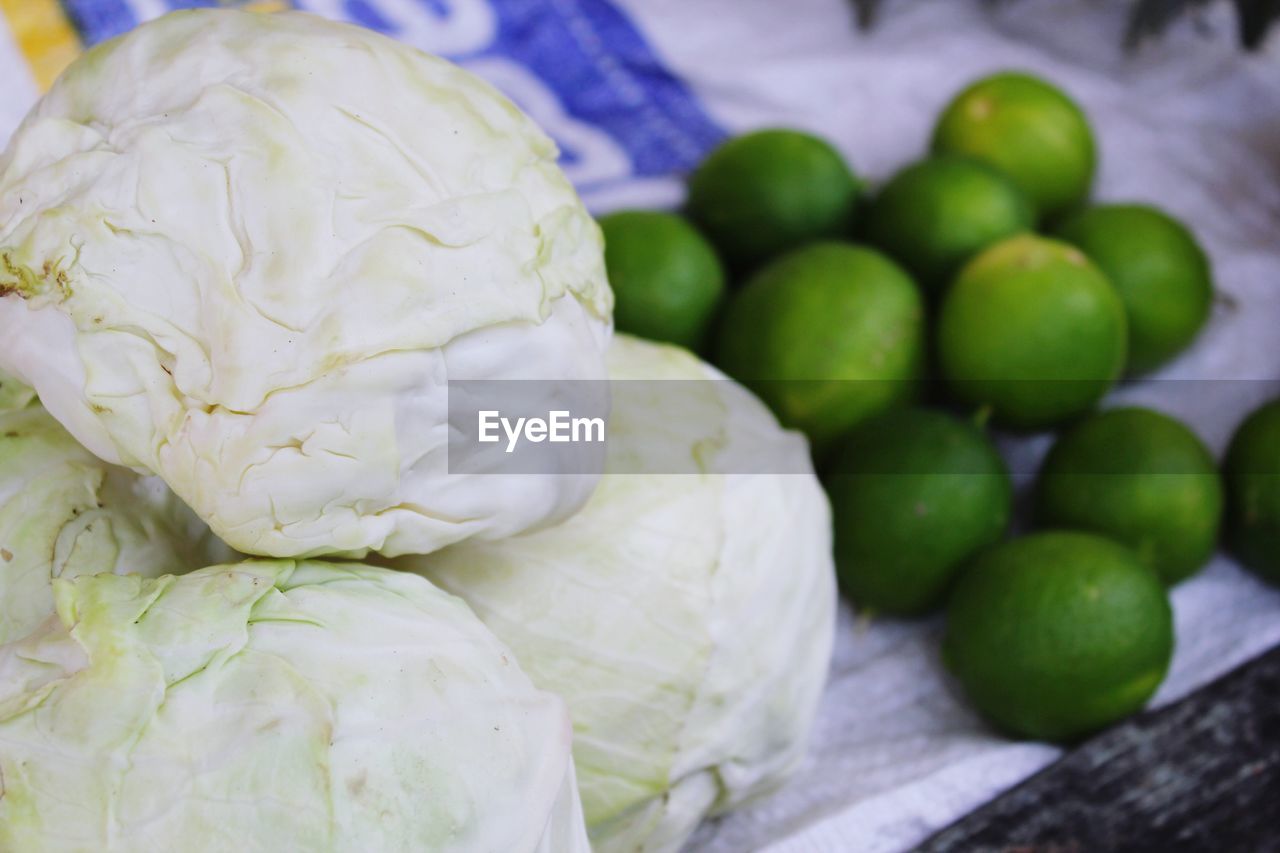 food, food and drink, healthy eating, freshness, wellbeing, produce, fruit, vegetable, no people, green, close-up, plant, organic, dish, raw food, cabbage, indoors, lime, still life, retail, market