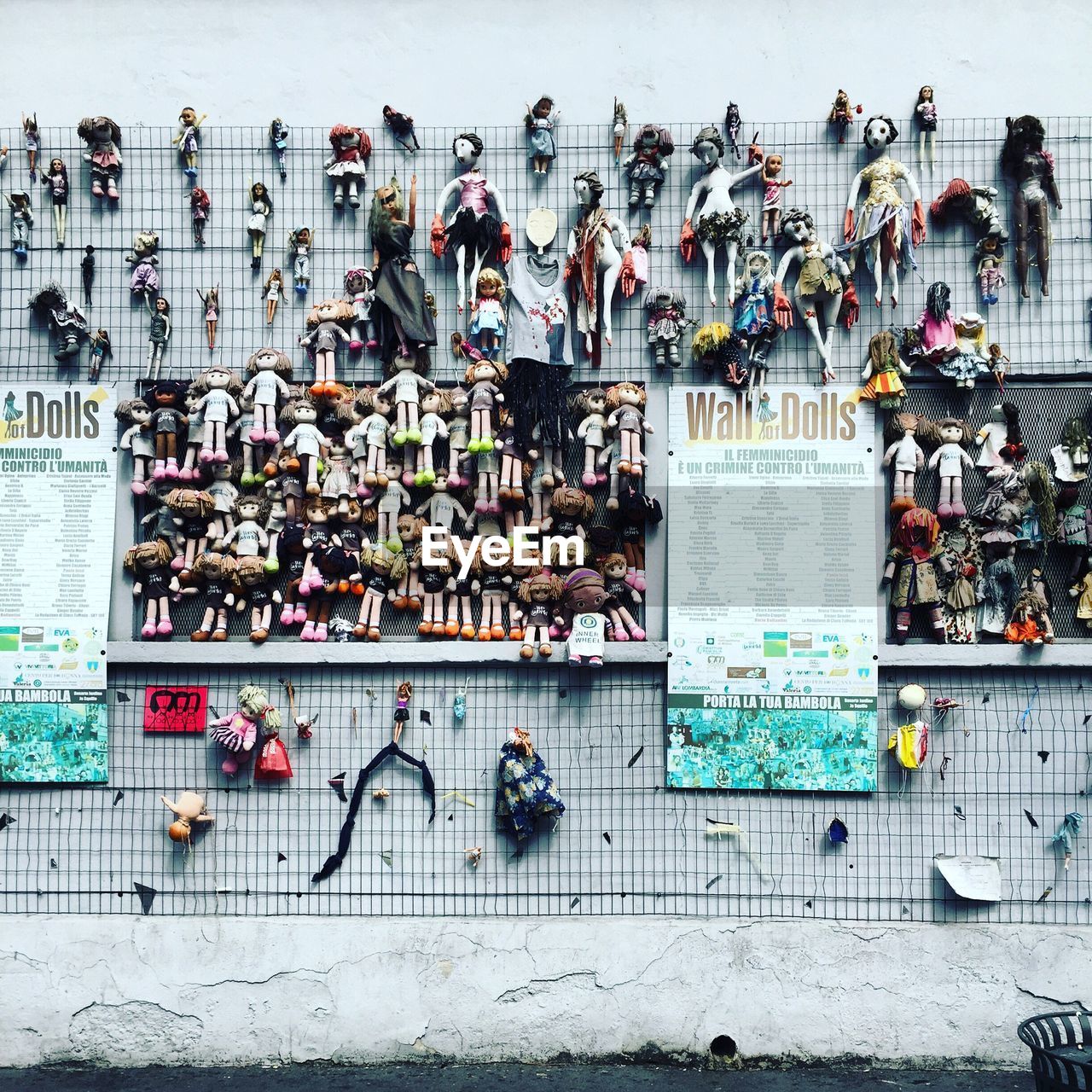 Wall of dolls during milan fashion week