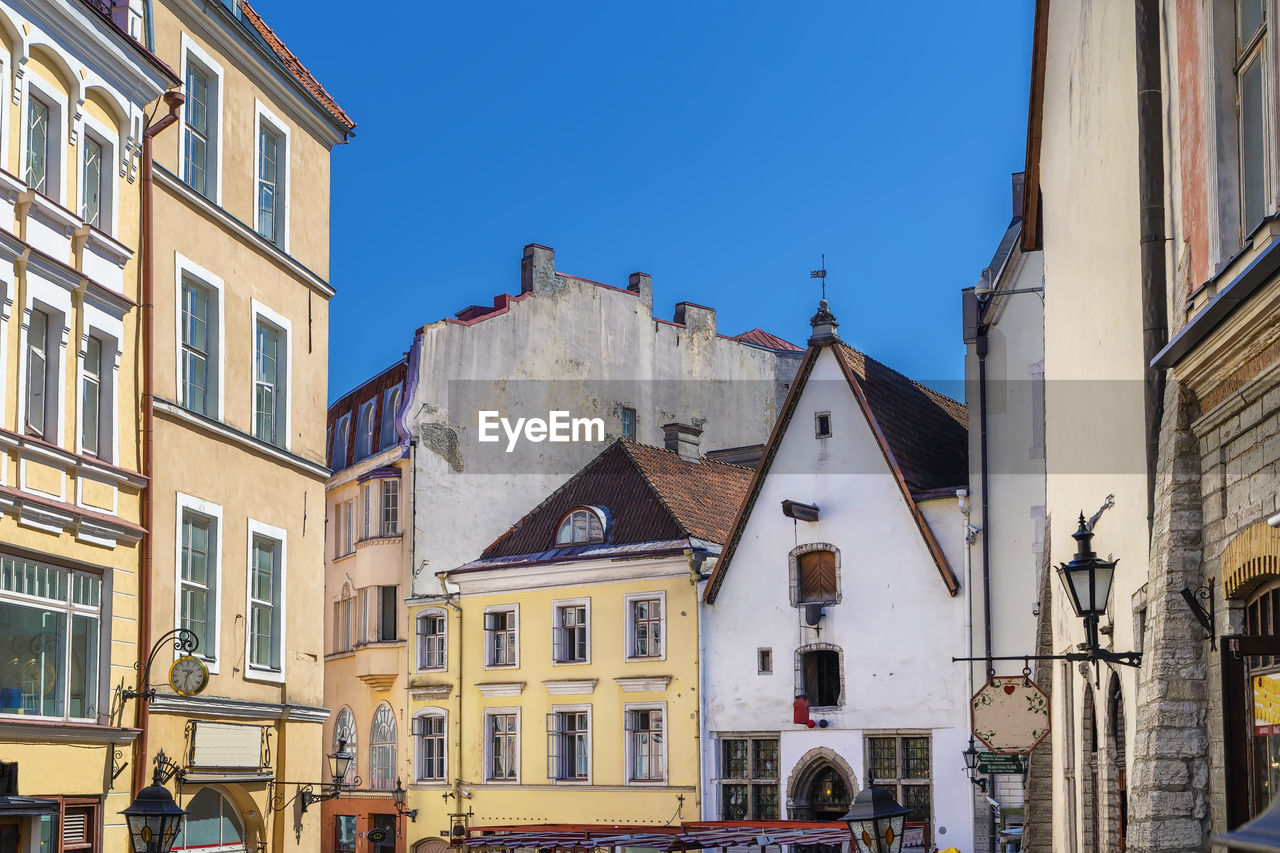 Street with historical houses in tallinn old town, estonia