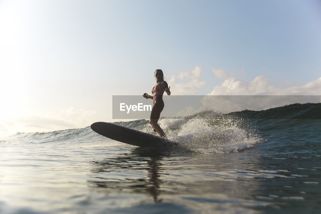 Female surfer in ocean