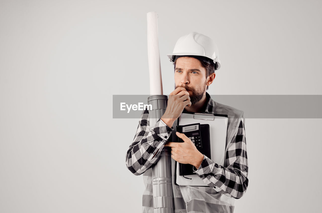 MAN WORKING ON WHITE BACKGROUND