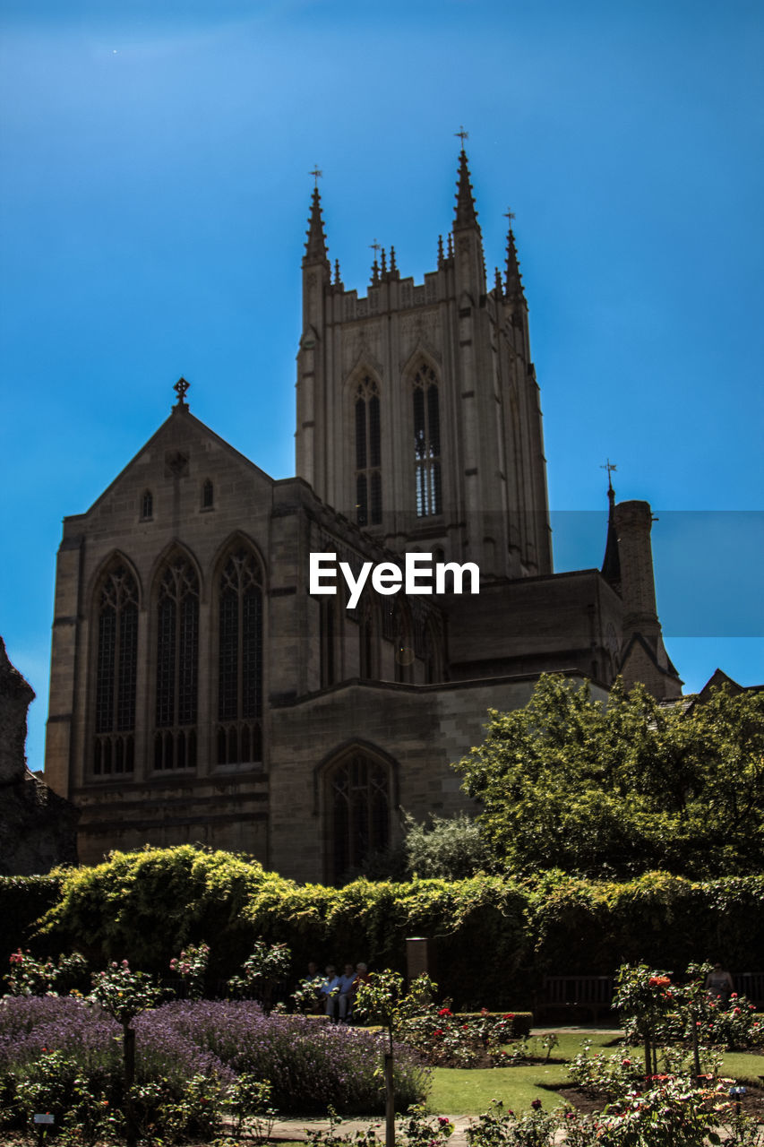 Low angle view of church against blue sky