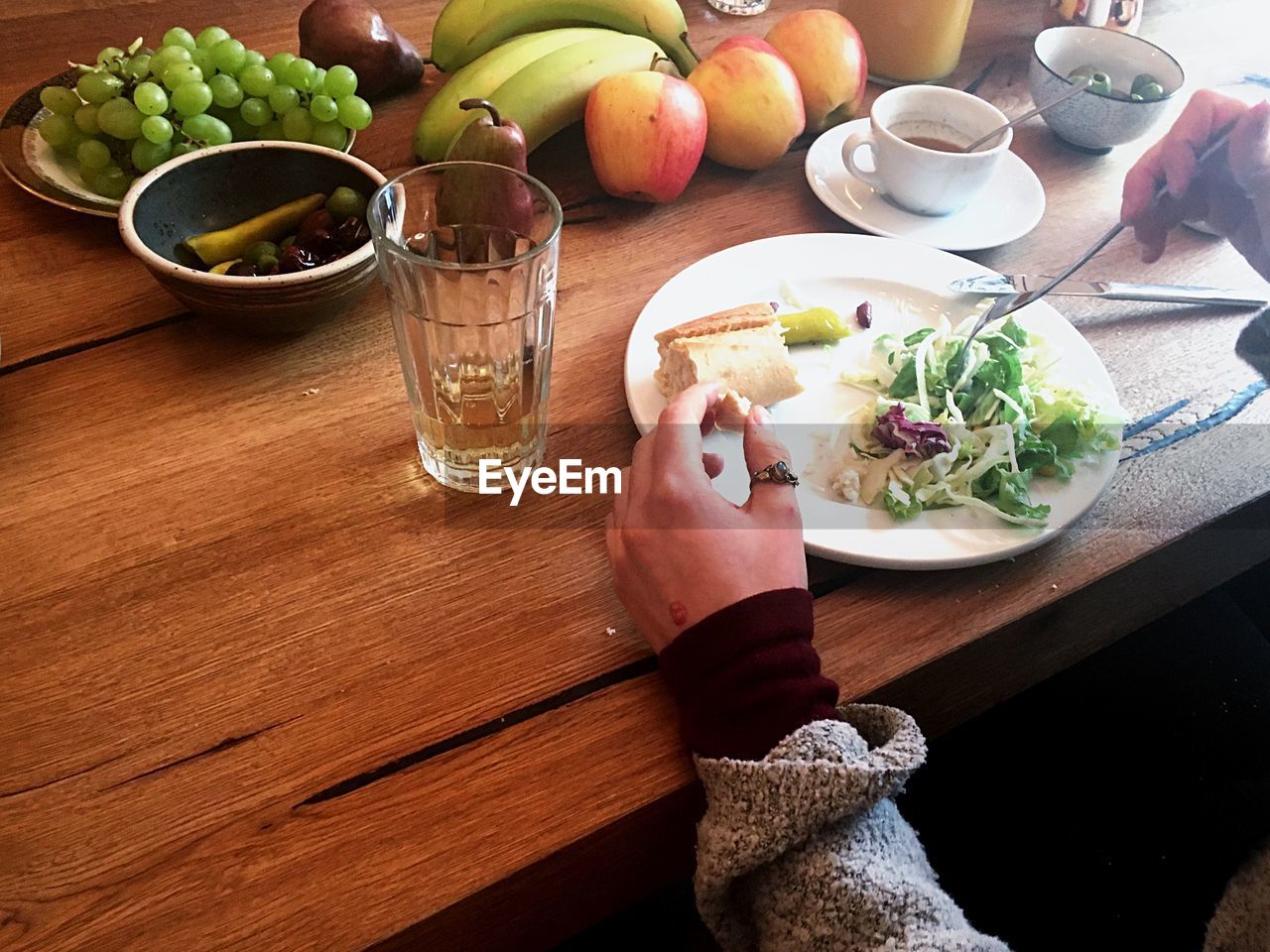 Cropped image of person having breakfast