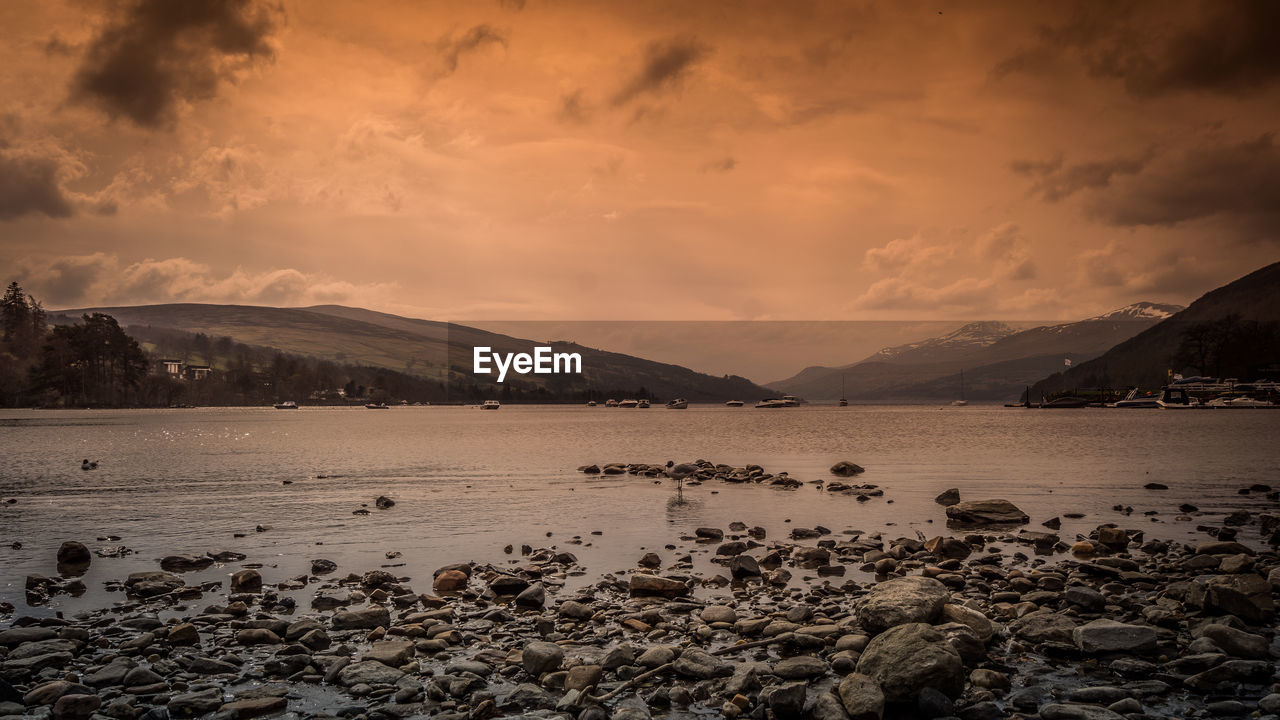 Scenic view of sea against sky during sunset