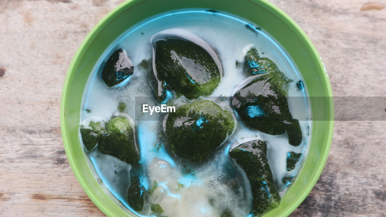 High angle view of  a bowl of grass jelly on table