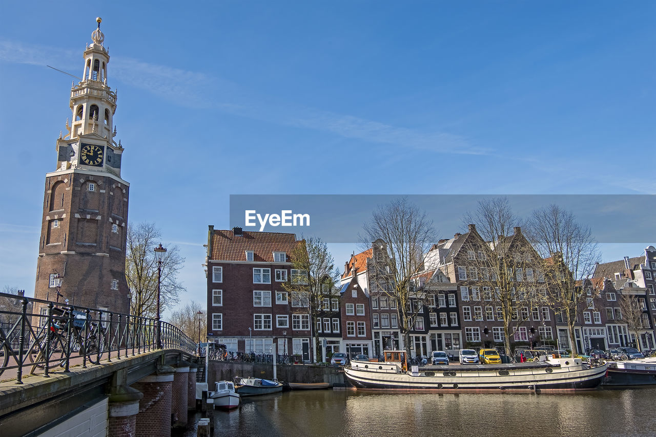 City scenic from amsterdam in the netherlands with the montelbaan tower