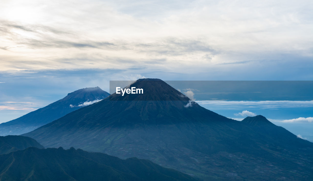 The view from the top of mount prau and the activities of the climbers near the camping tent