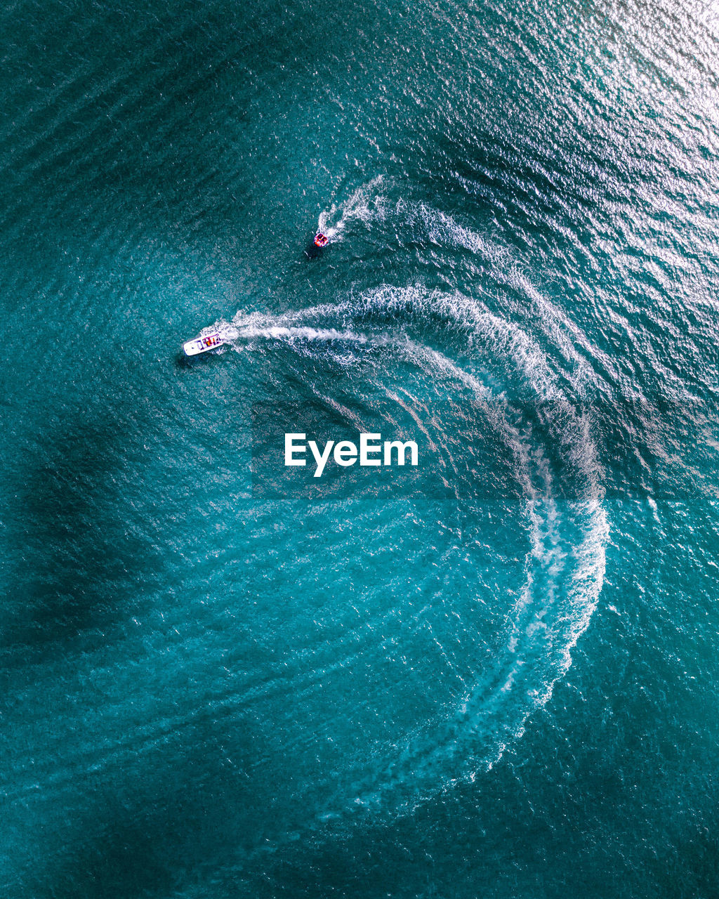 Aerial view of motorboats sailing in sea