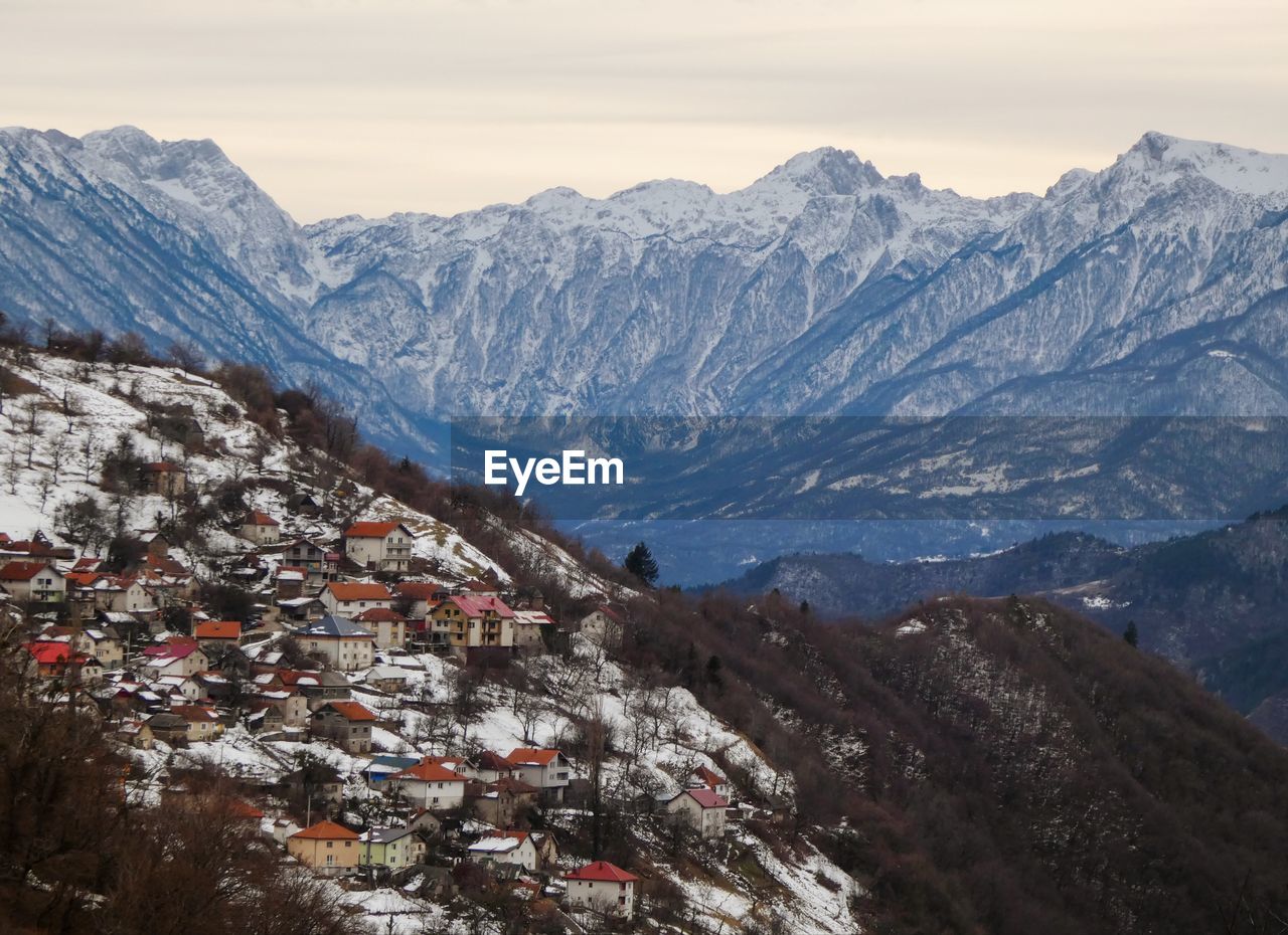 Scenic view of snowcapped mountains against sky