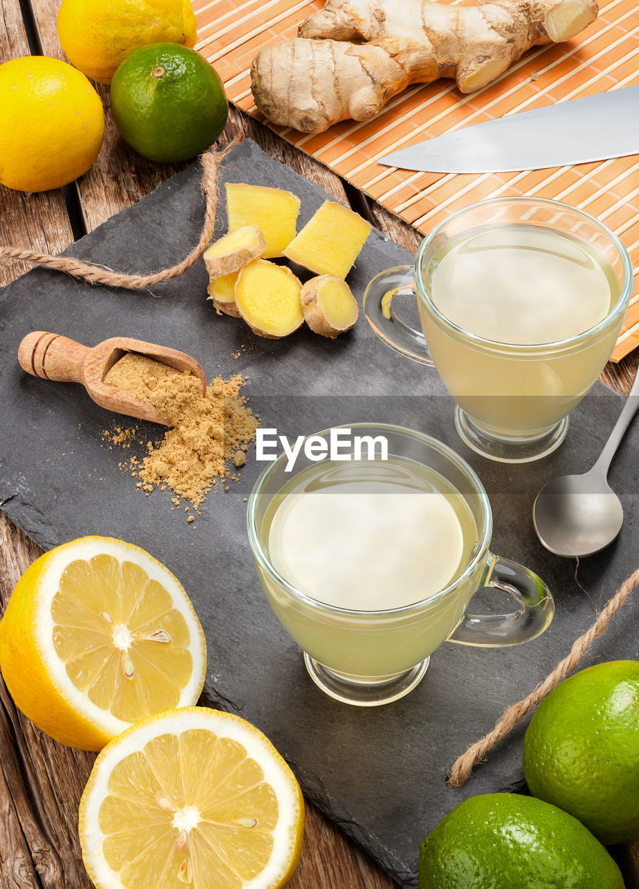 Drink aloe vera and lemon. glass cups on a slate tray.