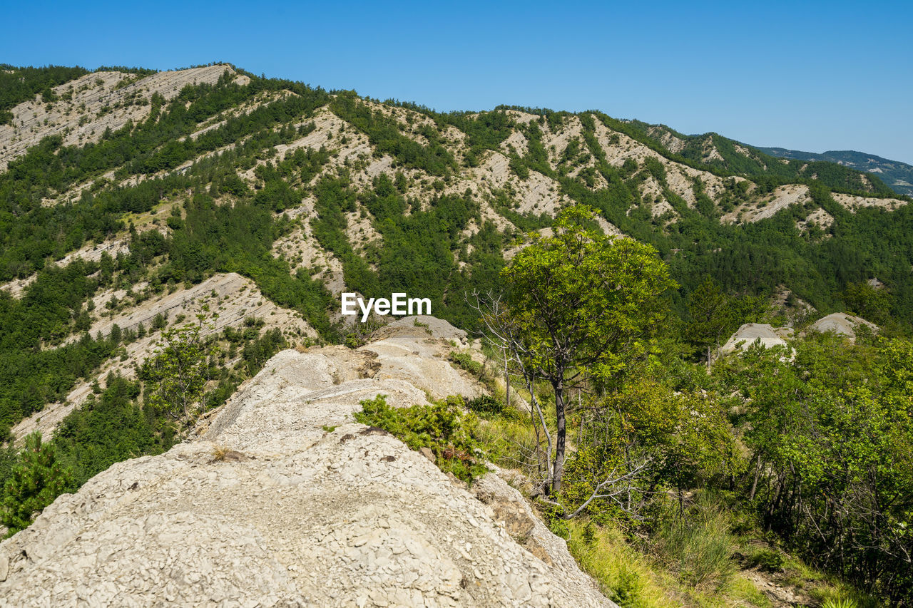 Scenic view of mountains against clear sky