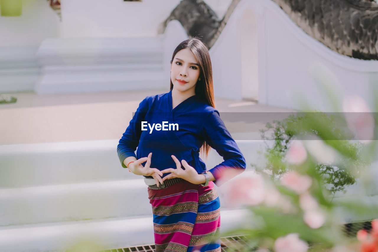 Thai women wearing beautiful traditional costumes.