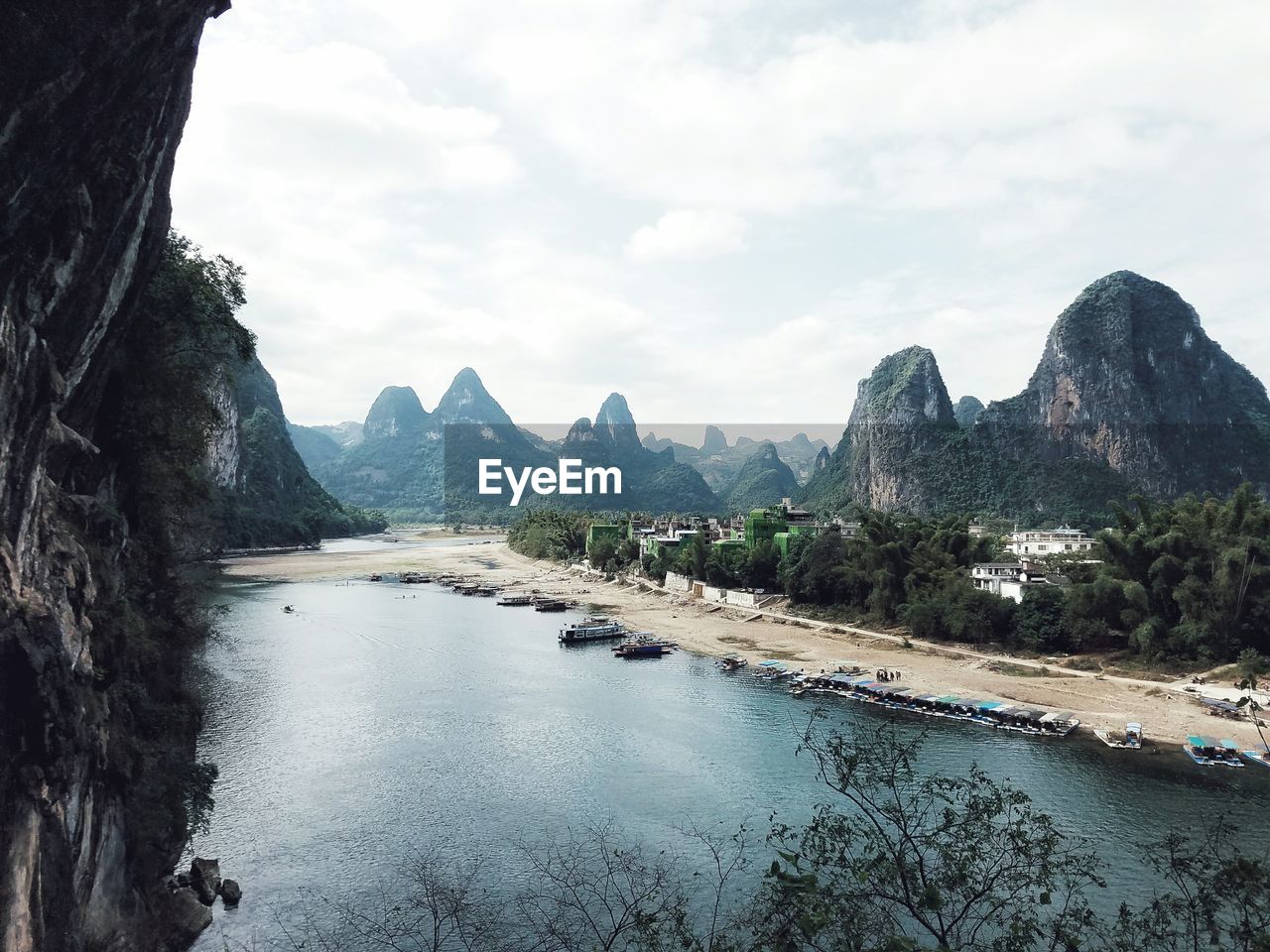 Scenic view of beach against mountains