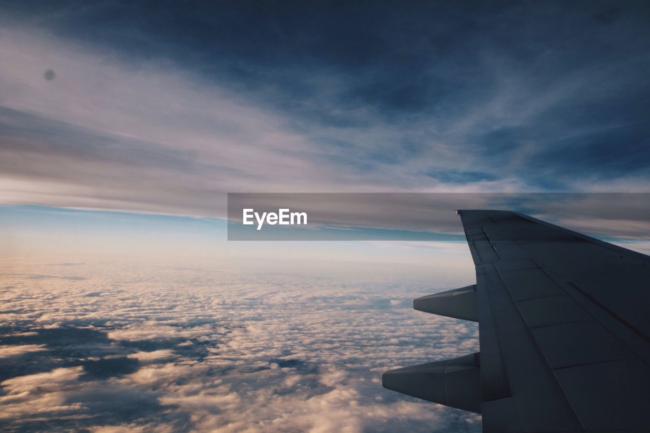 CLOUDY SKY OVER LANDSCAPE