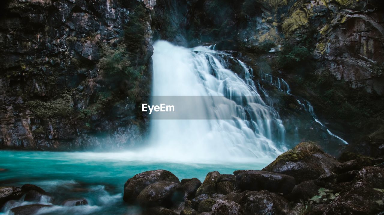 Long exposure image of waterfall in forest
