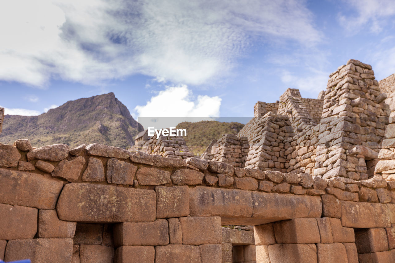 Low angle view of old ruin fort against sky