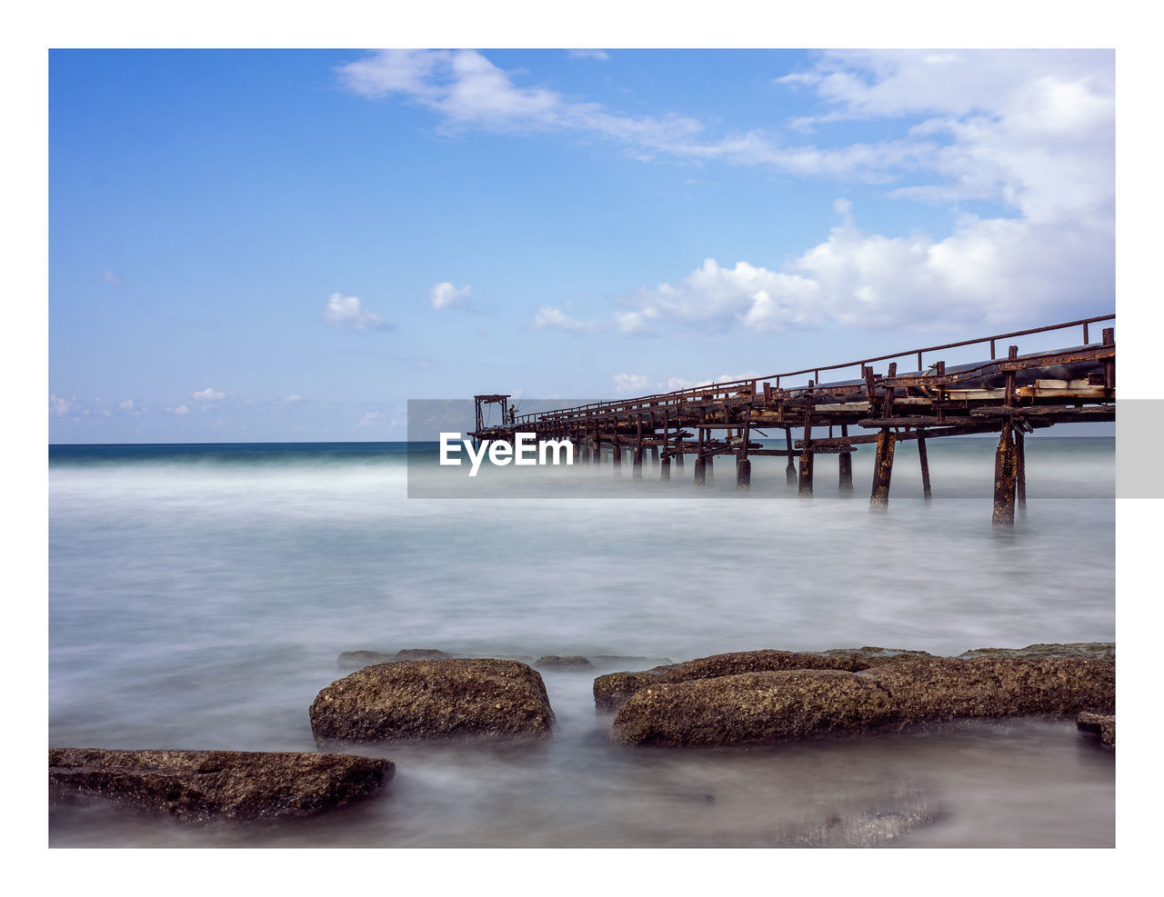 VIEW OF BRIDGE OVER SEA