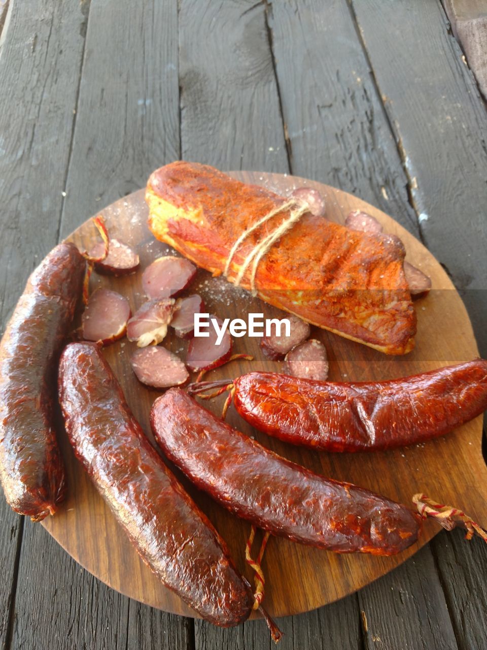 High angle view of home made smoked sausage on table