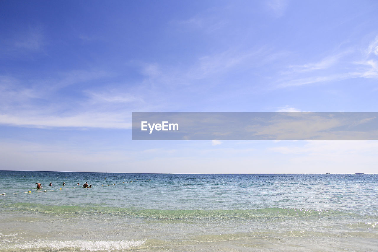 GROUP OF PEOPLE ON BEACH