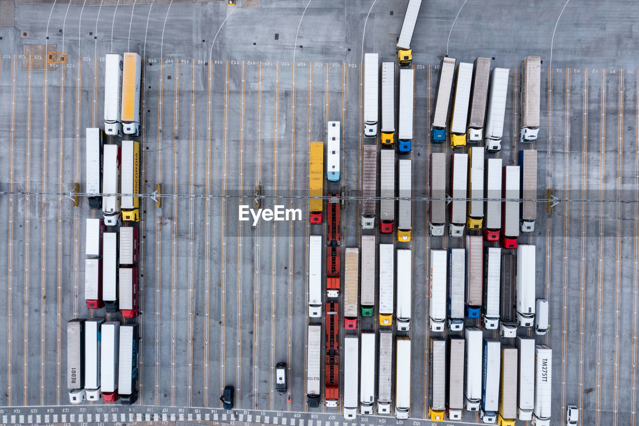 Aerial view of harbor and trucks parked along side each other in dover, uk.