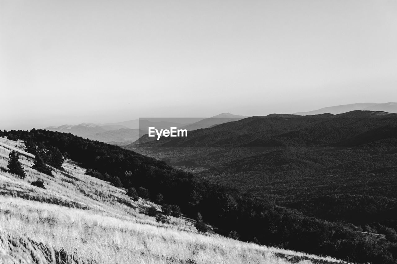 Scenic view of mountains against clear sky