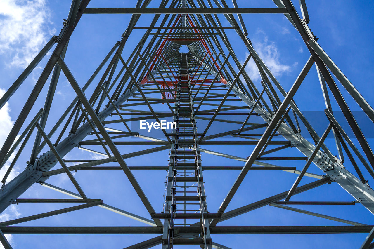 Low angle view of telephone pole technology mobile telephone base station telecommunication tower 