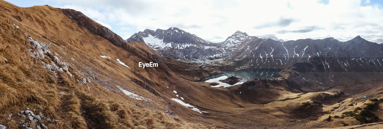 Scenic view of arid landscape during winter