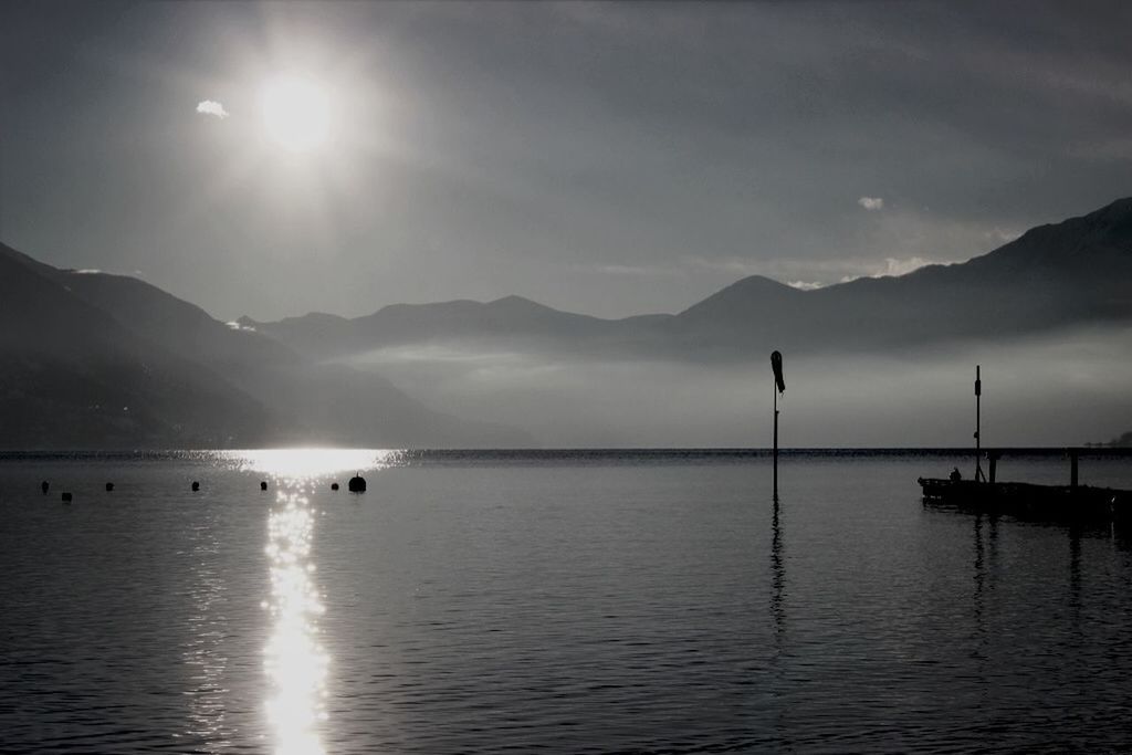 SCENIC VIEW OF MOUNTAINS AT SUNSET