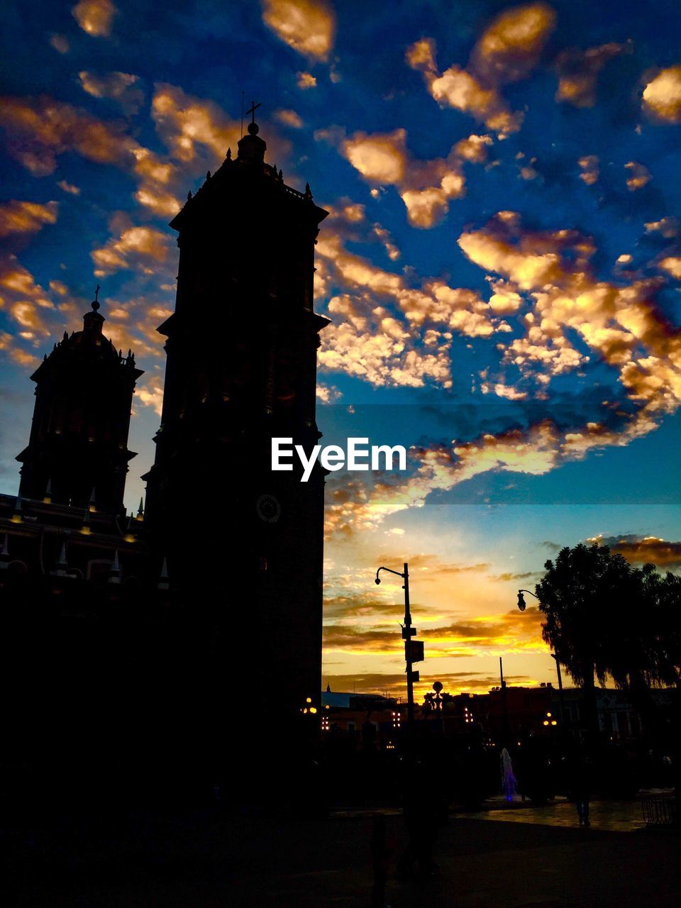 CLOCK TOWER AGAINST SKY AT NIGHT