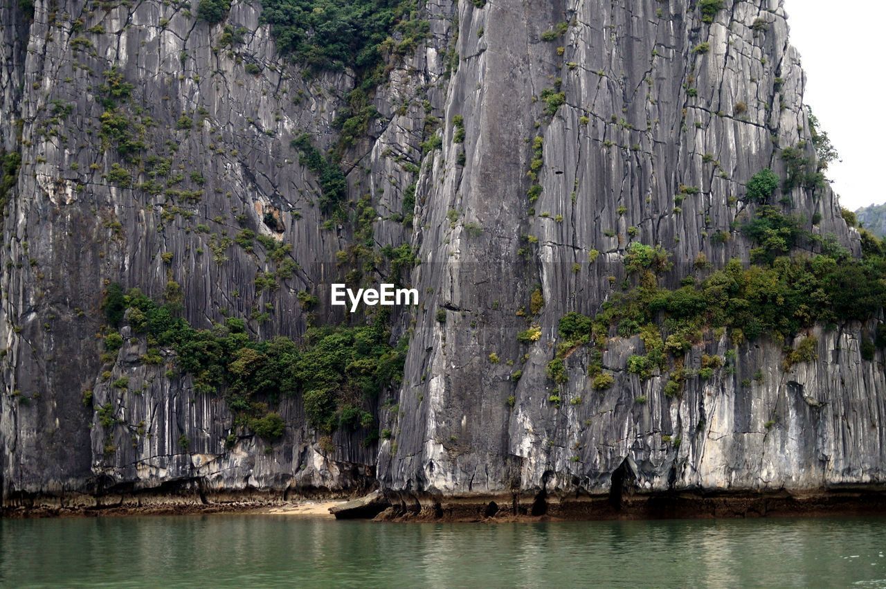 Scenic view of rock formation by sea