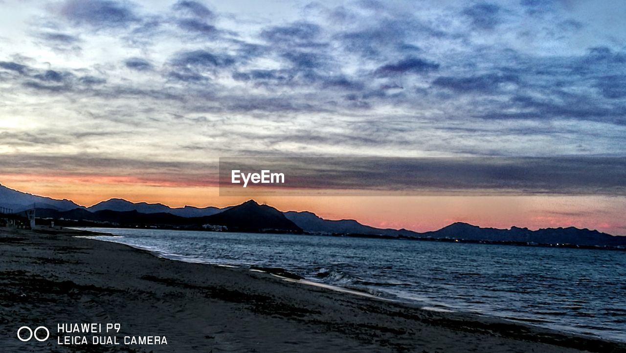 SCENIC VIEW OF DRAMATIC SKY OVER MOUNTAINS