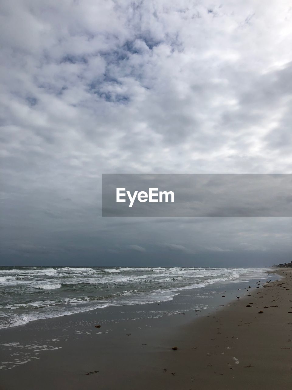 VIEW OF BEACH AGAINST SKY