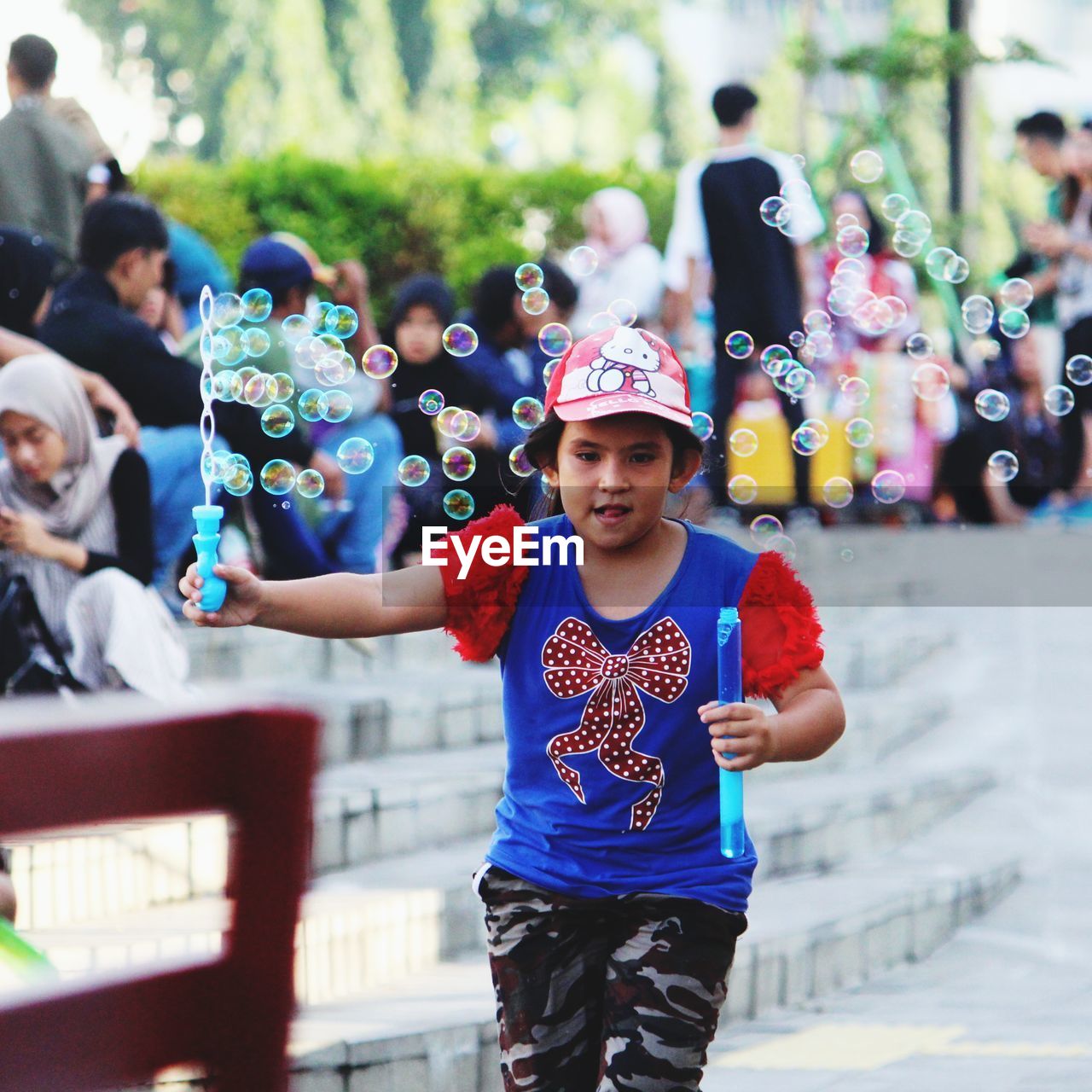 HIGH ANGLE VIEW OF BOYS AND BUBBLES