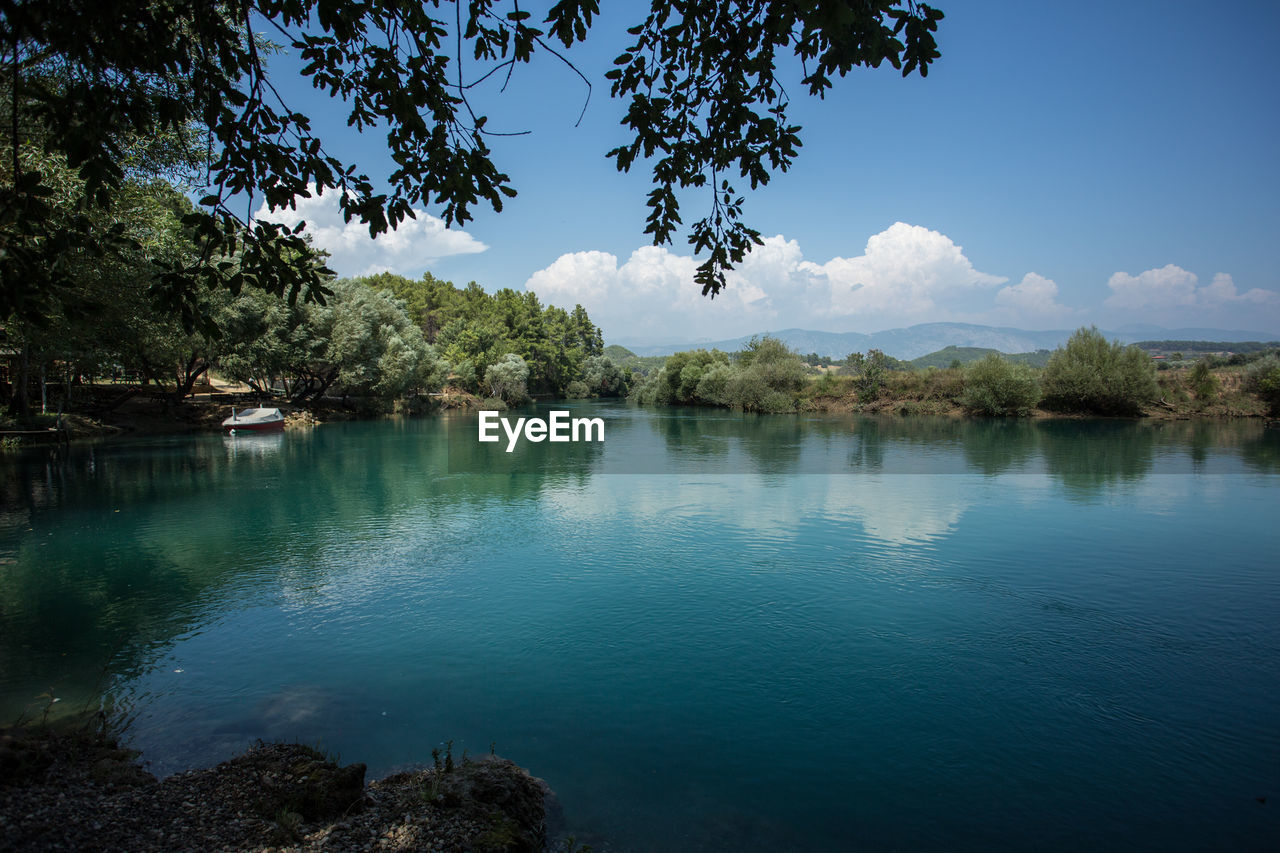 SCENIC VIEW OF CALM LAKE