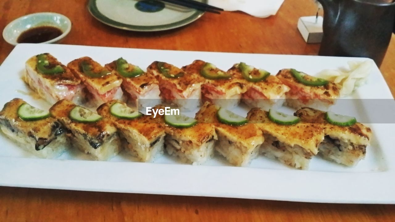 CLOSE-UP OF SERVED FOOD IN PLATE