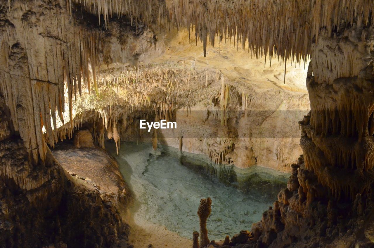 View of stalactites and stalagmites in cave
