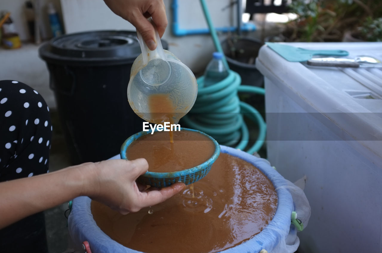 Squeezing tamarind water ingredients for process of making indigo dye , thai nature dye