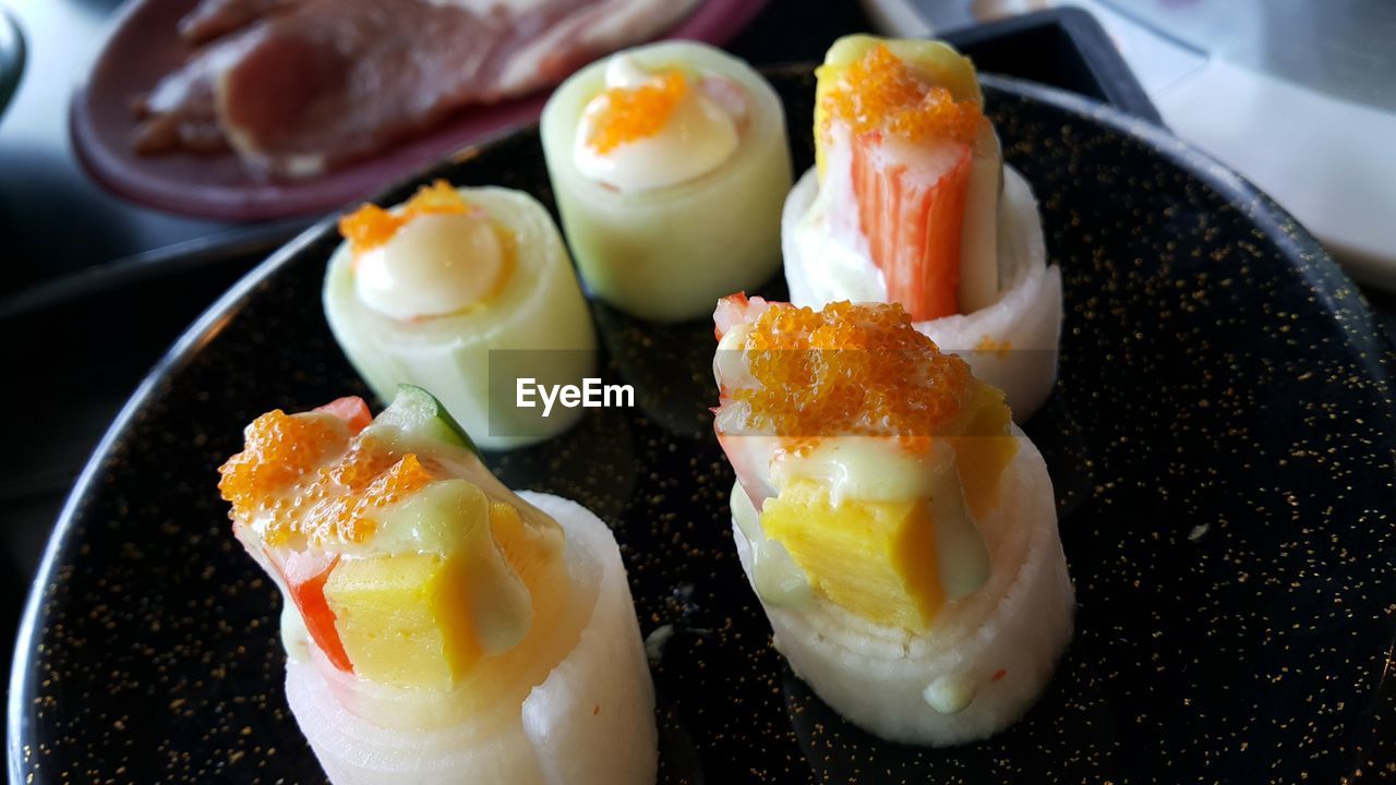 Close-up of sushi served on plate