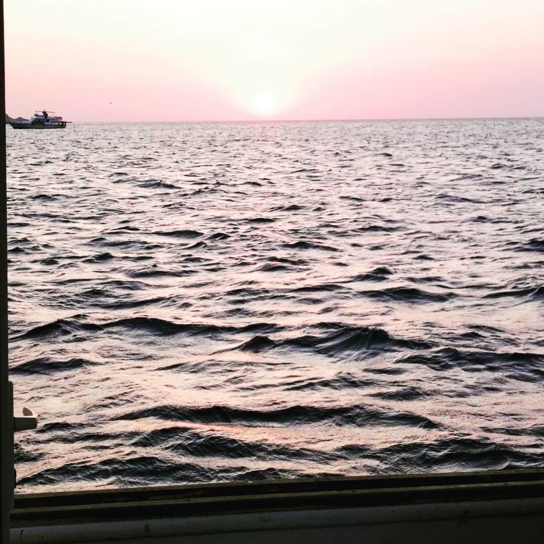 VIEW OF SEA AT SUNSET