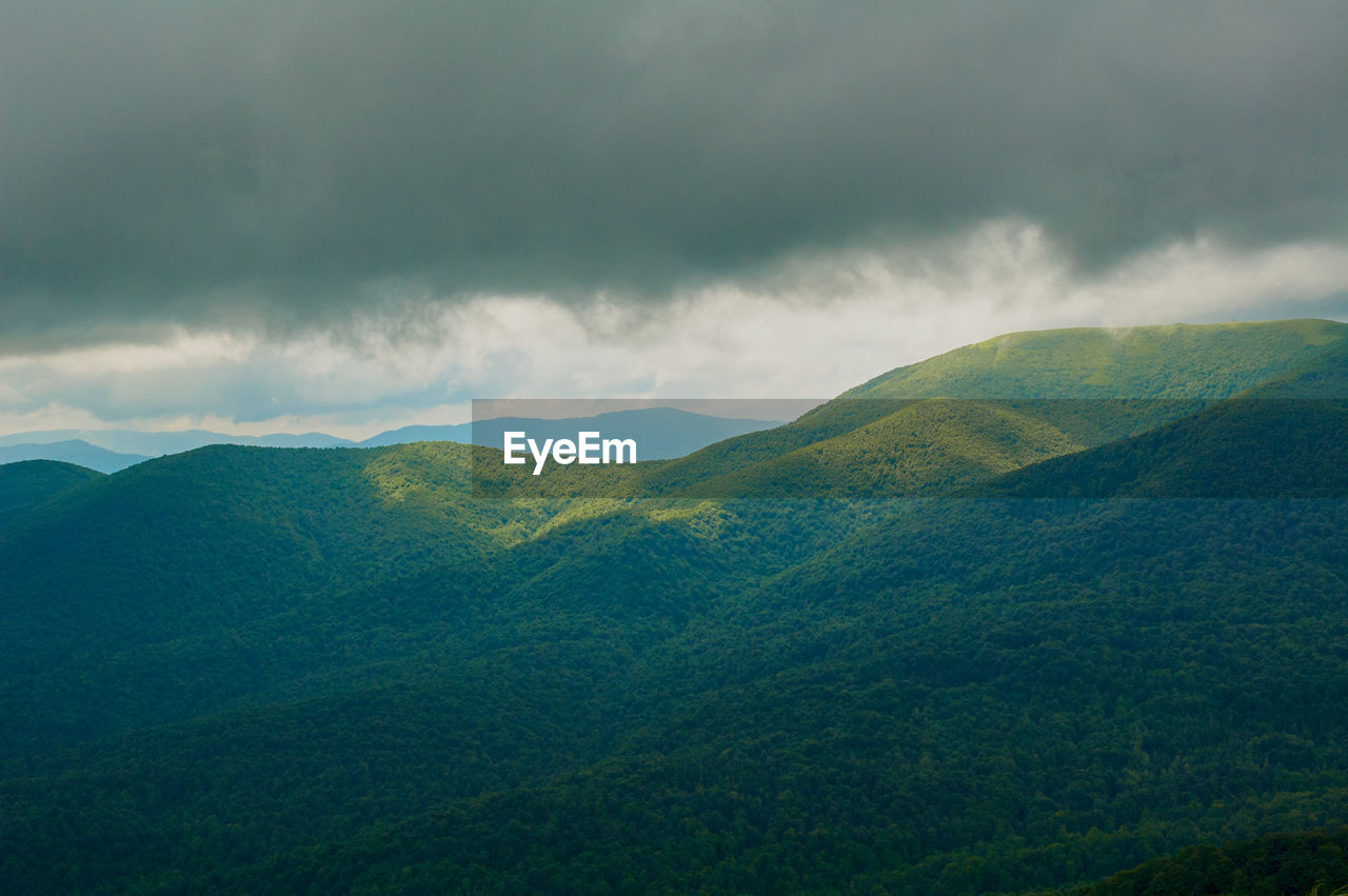 SCENIC VIEW OF MOUNTAIN AGAINST SKY