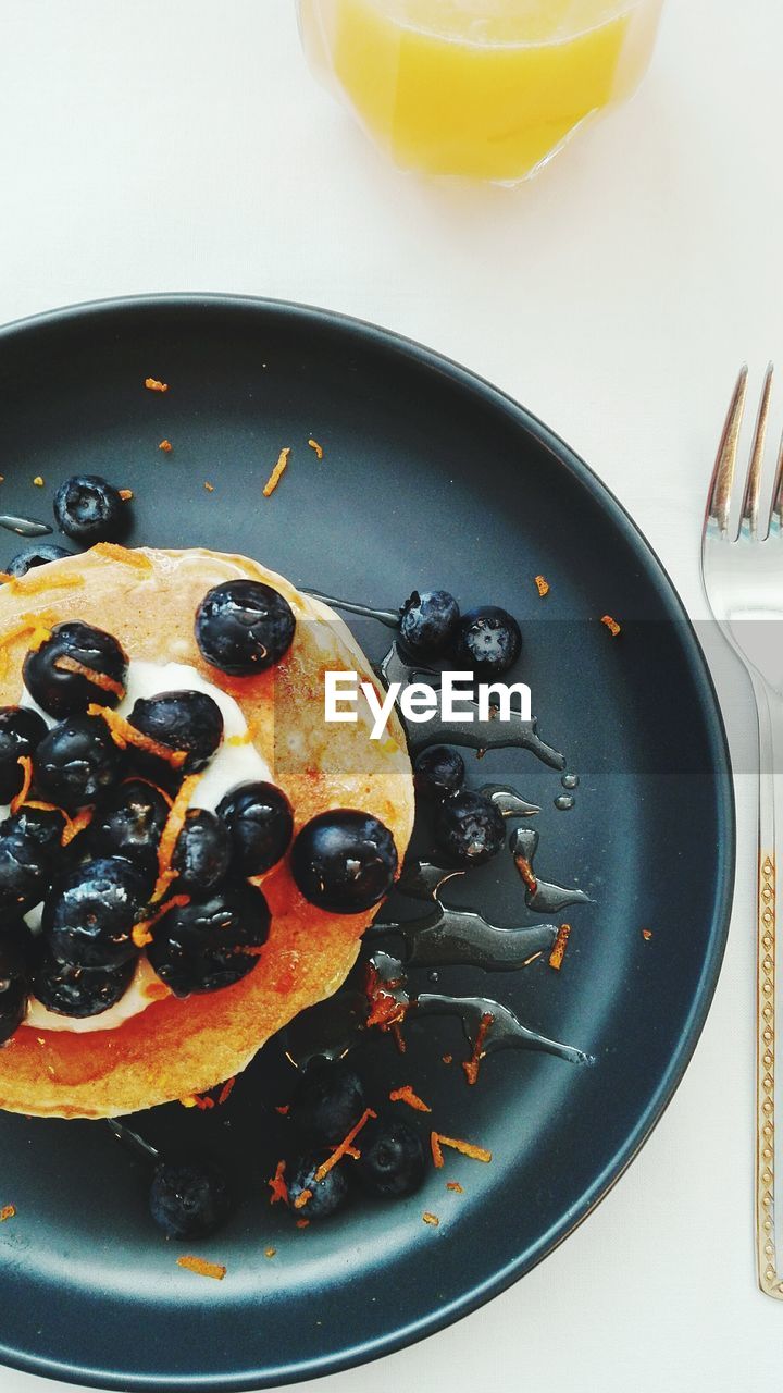 Close-up of breakfast in plate on table