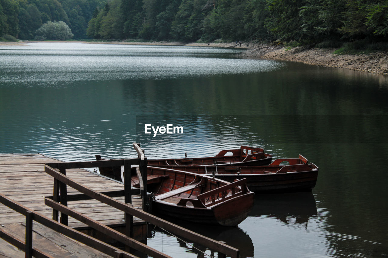 Boat moored in lake